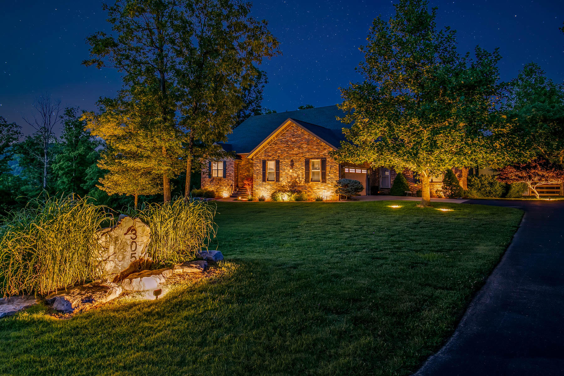 dimly lit outdoor lighting for a large-scale residential home